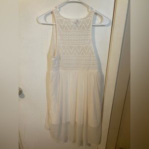 Adorable Cream White Flowy Dress. Longer and See-Thru in the Back.